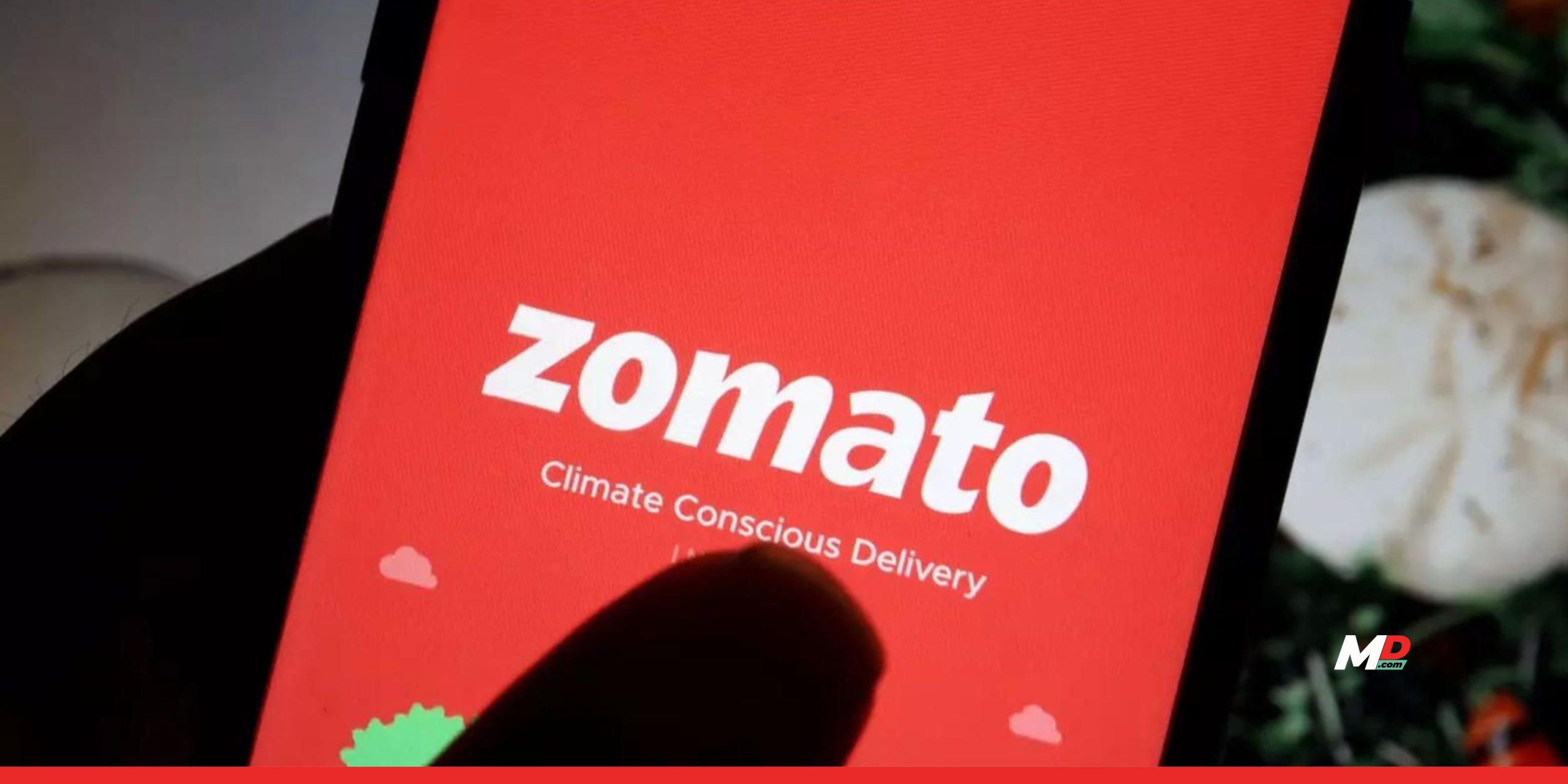 Zomato shares soar to record high after fee hike 